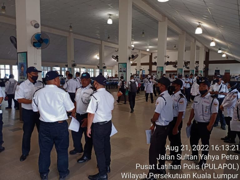 Officers attending a training session in a hall
